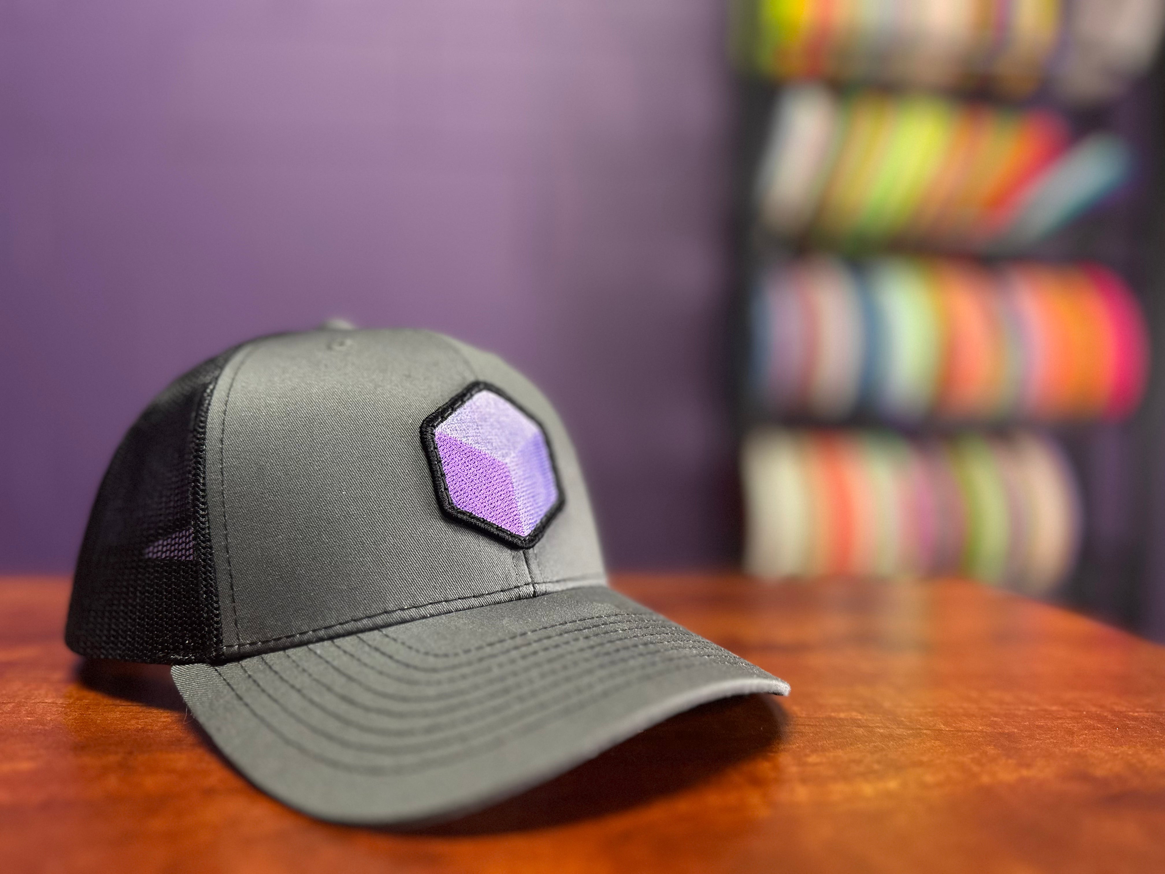 Six Sided Discs Patch Trucker Hat